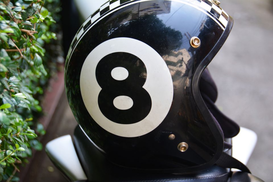 Close up of a black motorbike helmet