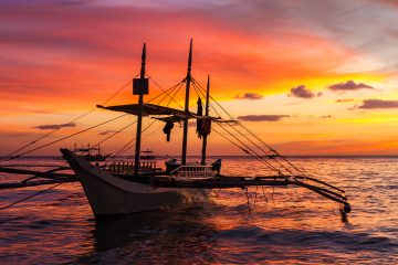 sail boat at sunset on boracay island