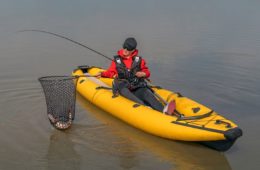 Kayak fishing on lake