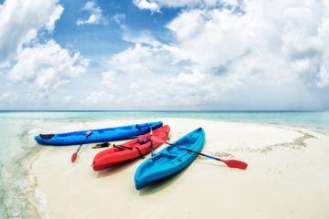 3 Kayaks on the shore